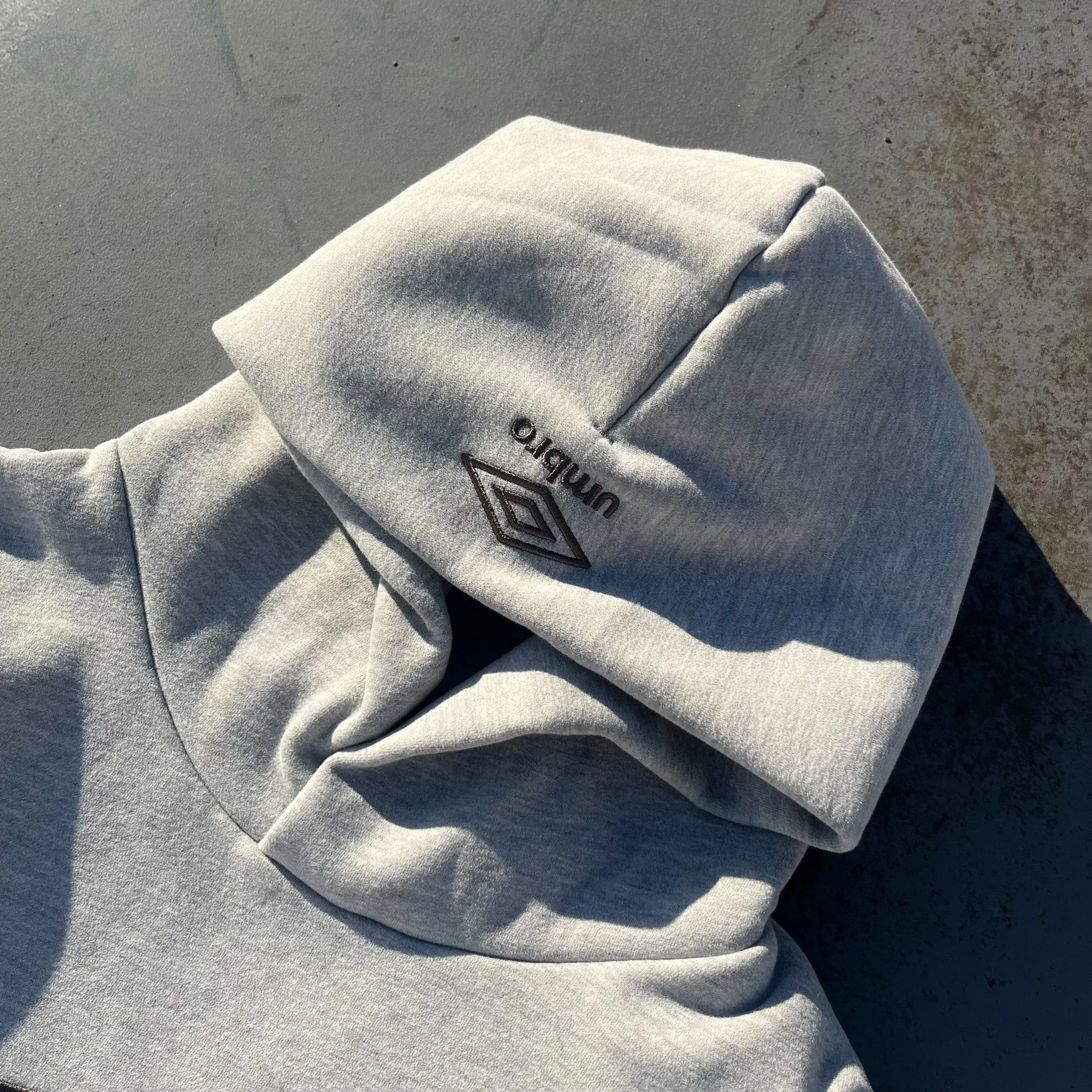 9090 × umbro Collaboration Logo Hoodie