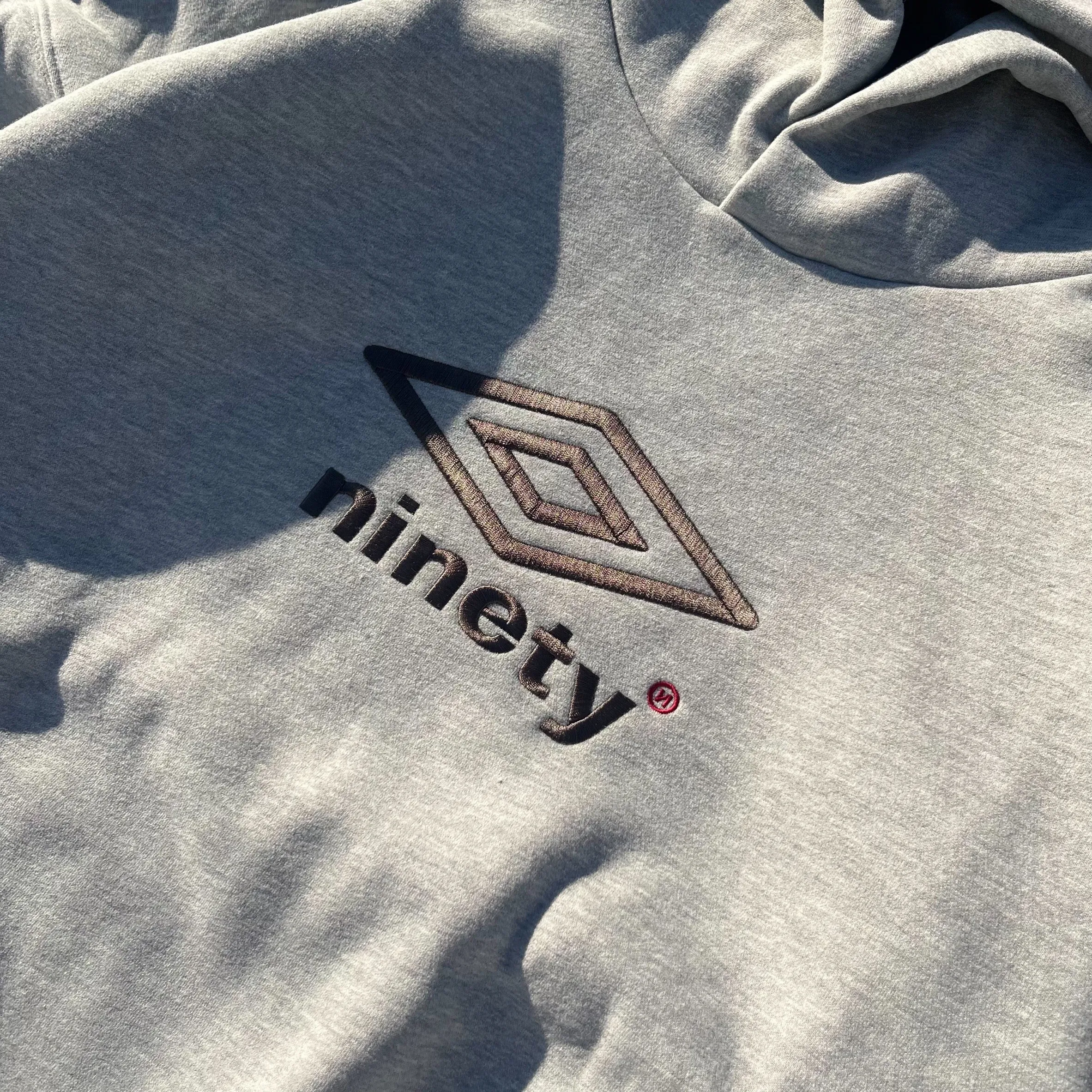 9090 × umbro Collaboration Logo Hoodie